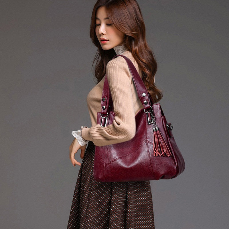 High-quality PU leather tassel High capacity Handbags Mssza